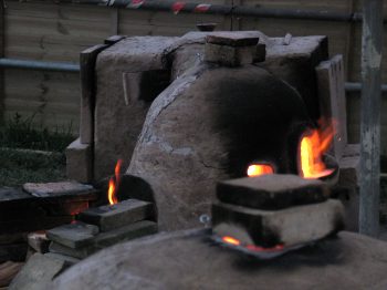 22. A night view of the tank furnace.