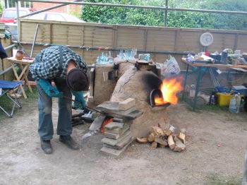 27. Finally getting the sandstone wall right. Stoking and temperature maintainance now proceeds well.