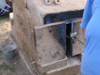 2. Putting a vessel into the oven.