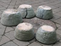 Underside of pots showing cracks in daub.