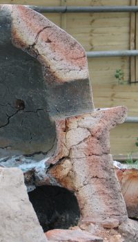 Tank furnace: section through gathering hole. (Stitched photograph).