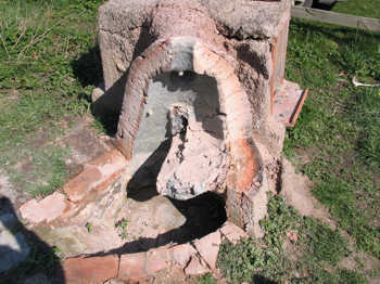 12. Tank furnace three-quarters removed.