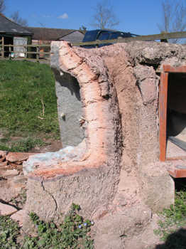 13. Tank furnace three-quarters removed.