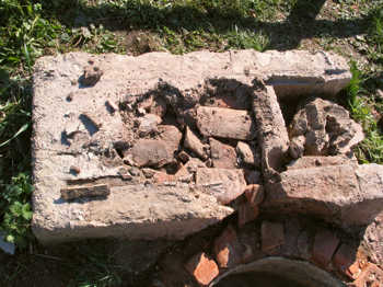 36. Demolishing the floor of the oven.