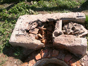 37. Demolishing the floor of the oven.