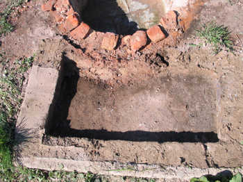 39. Demolishing the floor of the oven.