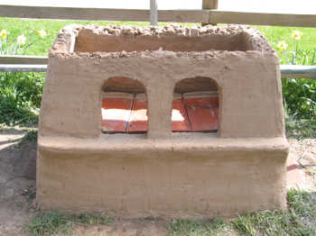 31. The tile shelves in place and the lehr is ready to receive the roof.