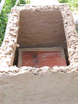 32. The tile shelves in place and the lehr is ready to receive the roof.