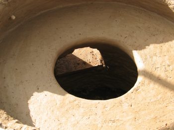 18. Close up of the hole in the floor of the pot chamber.