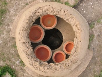 27. The pots viewed from above (the three shelves in front of the gathering holes can be seen and the stoke hole is in the top right of the photograph).