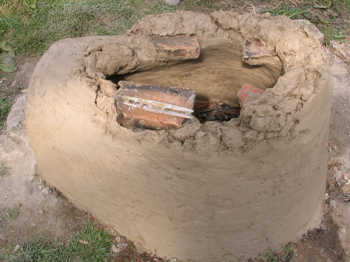 17. Fixing the fragments in place with daub.