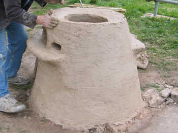 30. Smoothing the wall above the gathering hole.