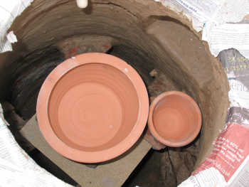 10. A view of both pots in position (note the gathering hole to the right).