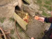 Lighting the pot furnace.