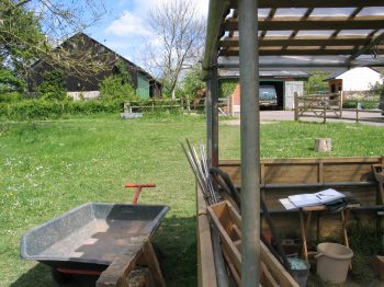 7. View towards the woodpile (in the black barn).