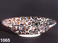 1065: Composite mosaic deep footed plate