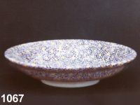 1067: Composite mosaic deep footed plate