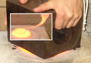 Pouring and flattening the molten glass