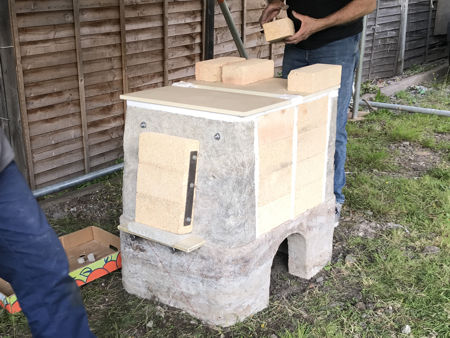 Placing the roof bricks