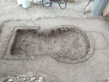 The firepit dug out - notice the slopes upwards from the centre