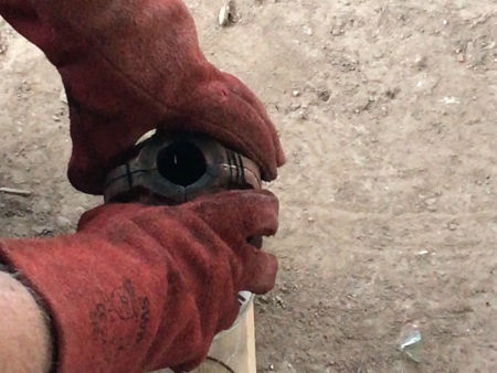 Myth beaker: the mould is held ready to be opened