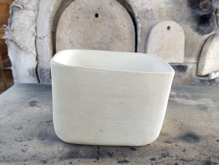 A square pot, with its 'deep' and 'shallow' end