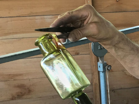 Square Bottle: shaping the handle