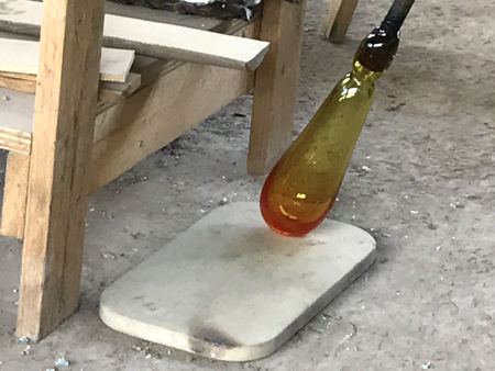 Storage Jar: using the floor marver to cool the base whilst blowing