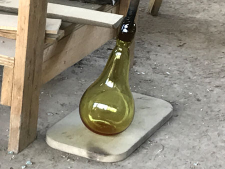 Storage Jar: using the floor marver to cool the base whilst blowing