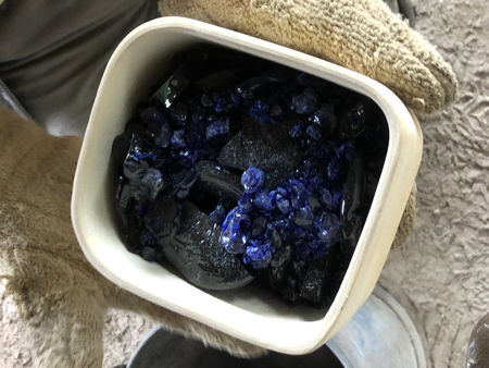 Setting two small square pots, one with cobalt blue glass in it (Photo © Fiona Rashleigh)