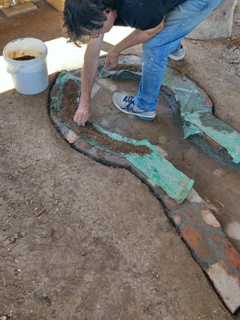 Preparing a bed for the furnace to sit on