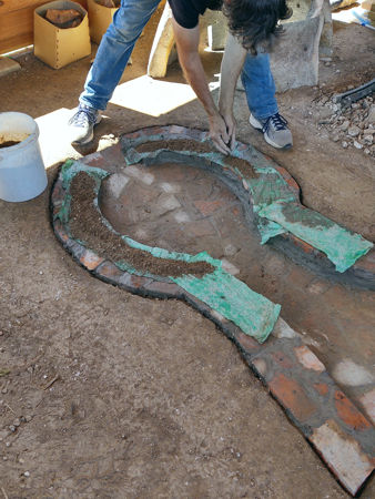 Preparing a bed for the furnace to sit on