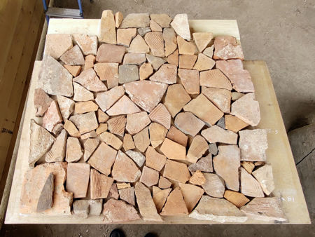 The tile fragments laid out