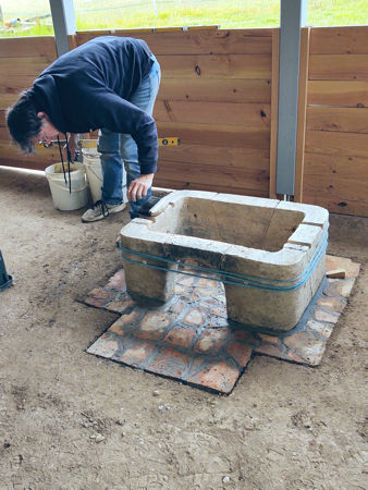 Filling in the gap between the floor and the wall with daub