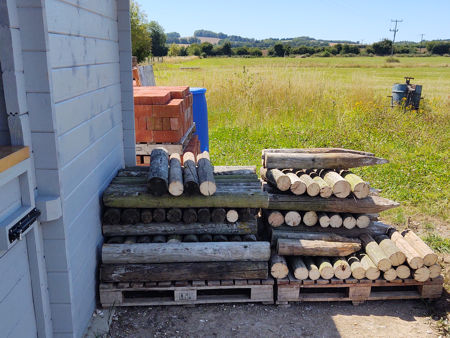 Cut-up old fence posts