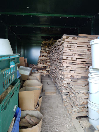 Dry wood inside the green container