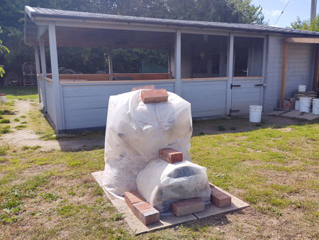 The reassembled furnace with its plastic bags