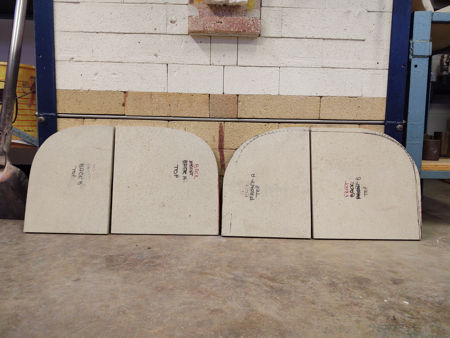 The upper shelves drying in front of the modern furnace