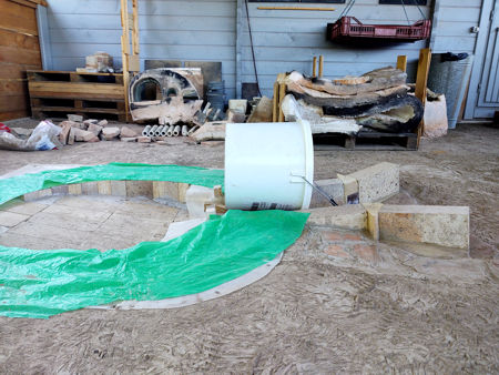 The bucket which will be the form for the stokehole is in position