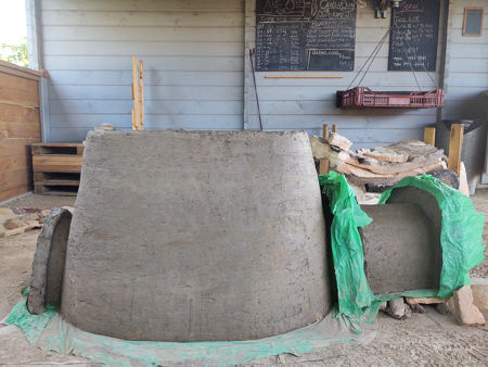 The lower inner wall is finished to just below the gathering hole floor