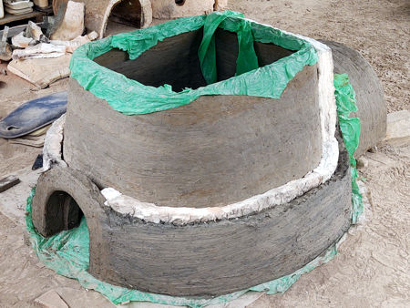 Building the outer wall with the ceramic fibre in place