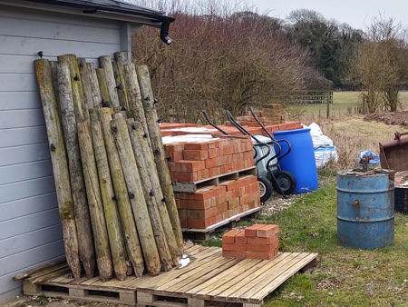 A supply of fence posts
