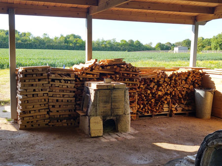 Wood stacked inside the shelter