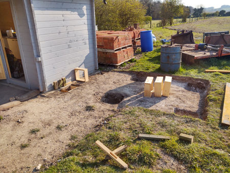 Fitting the wooden squares for the concrete