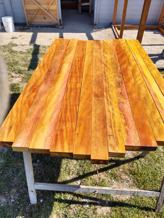 The Opepe floorboards having been given their coat of preservative