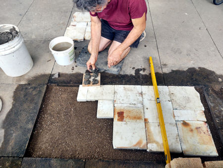 Laying the tiles