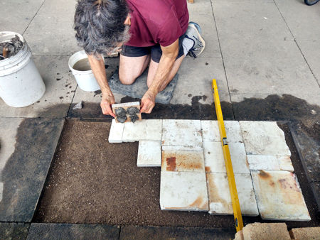 Laying the tiles