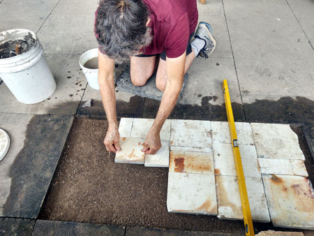 Laying the tiles