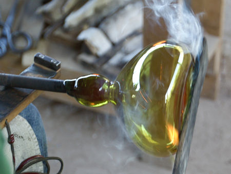 Using a wooden board to flatten the base (Photo © Betty Paton)