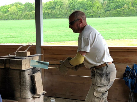 Steve with a pre-heated cylinder (Photo © Denise Allen)